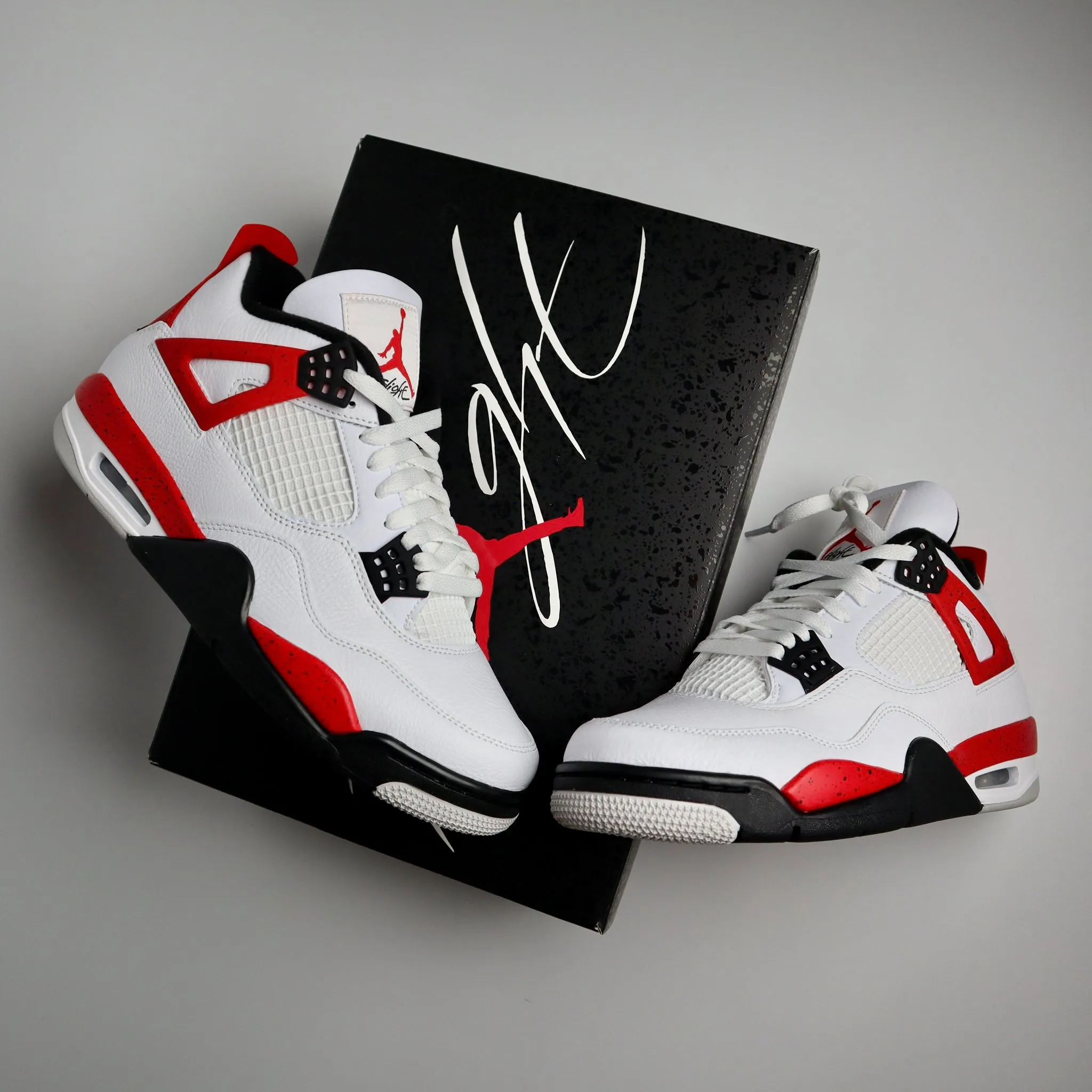 Jordan 4 Retro Red Cement