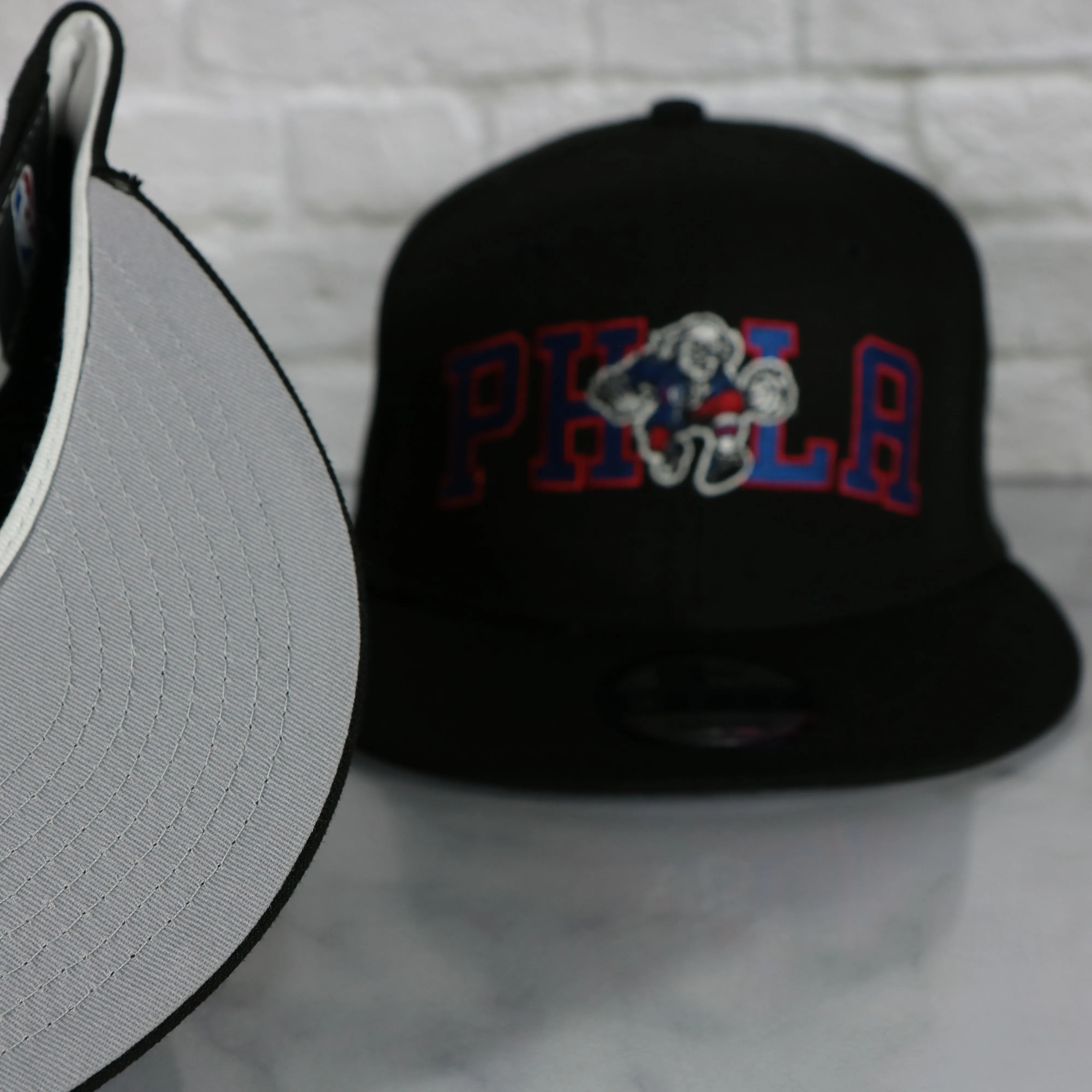 Philadelphia 76ers Wordmark Logo Blend Grey Bottom 9Fifty Snapback Cap | Black 950 Snap Cap